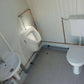 Mini Sanitärcontainer Toilette – kompakte WC-Kabine mit Waschbecken